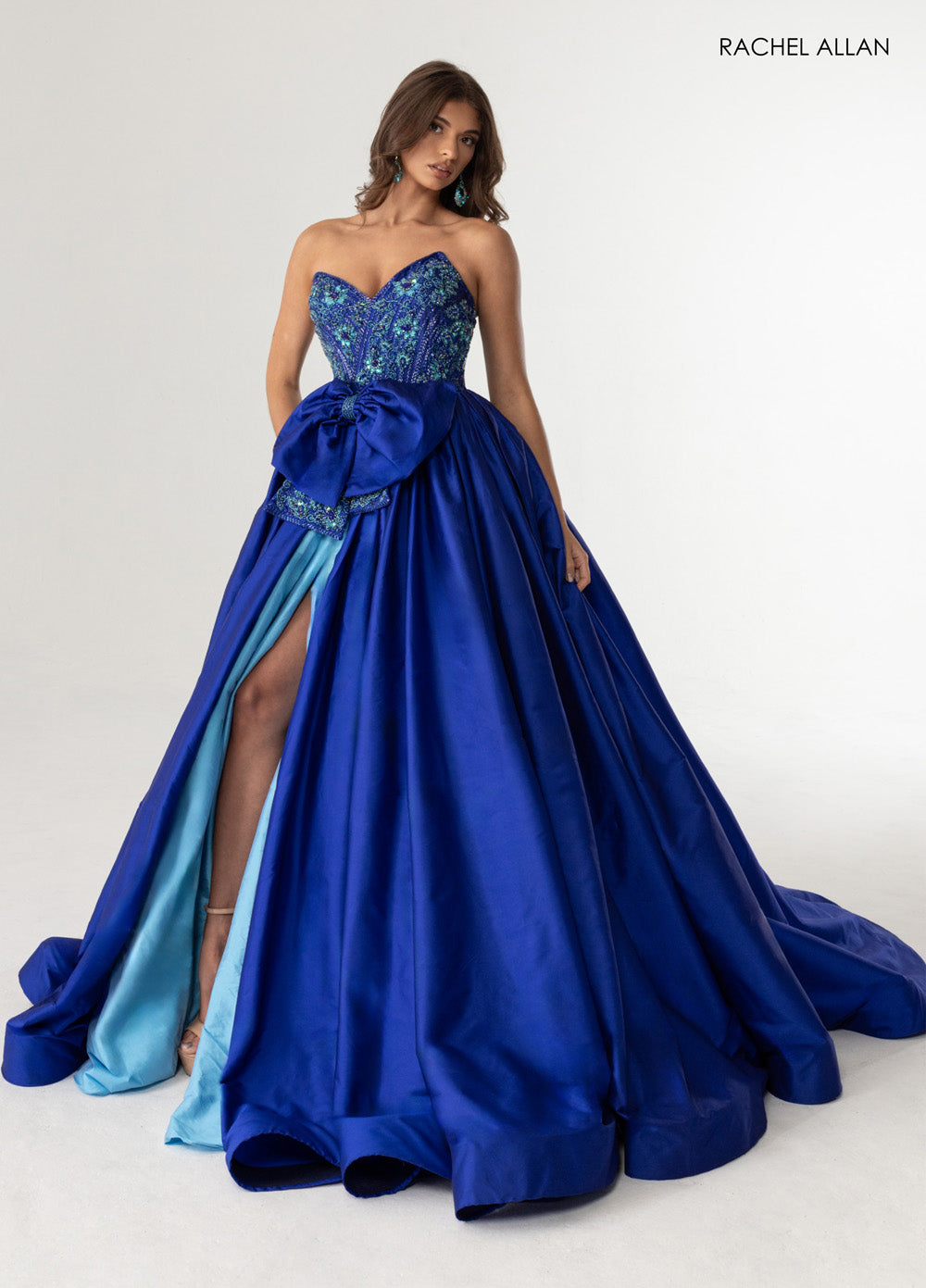 Rachel Allan 71068 Royal turquoise ballgown with beading and a high slit, front view prom dress.