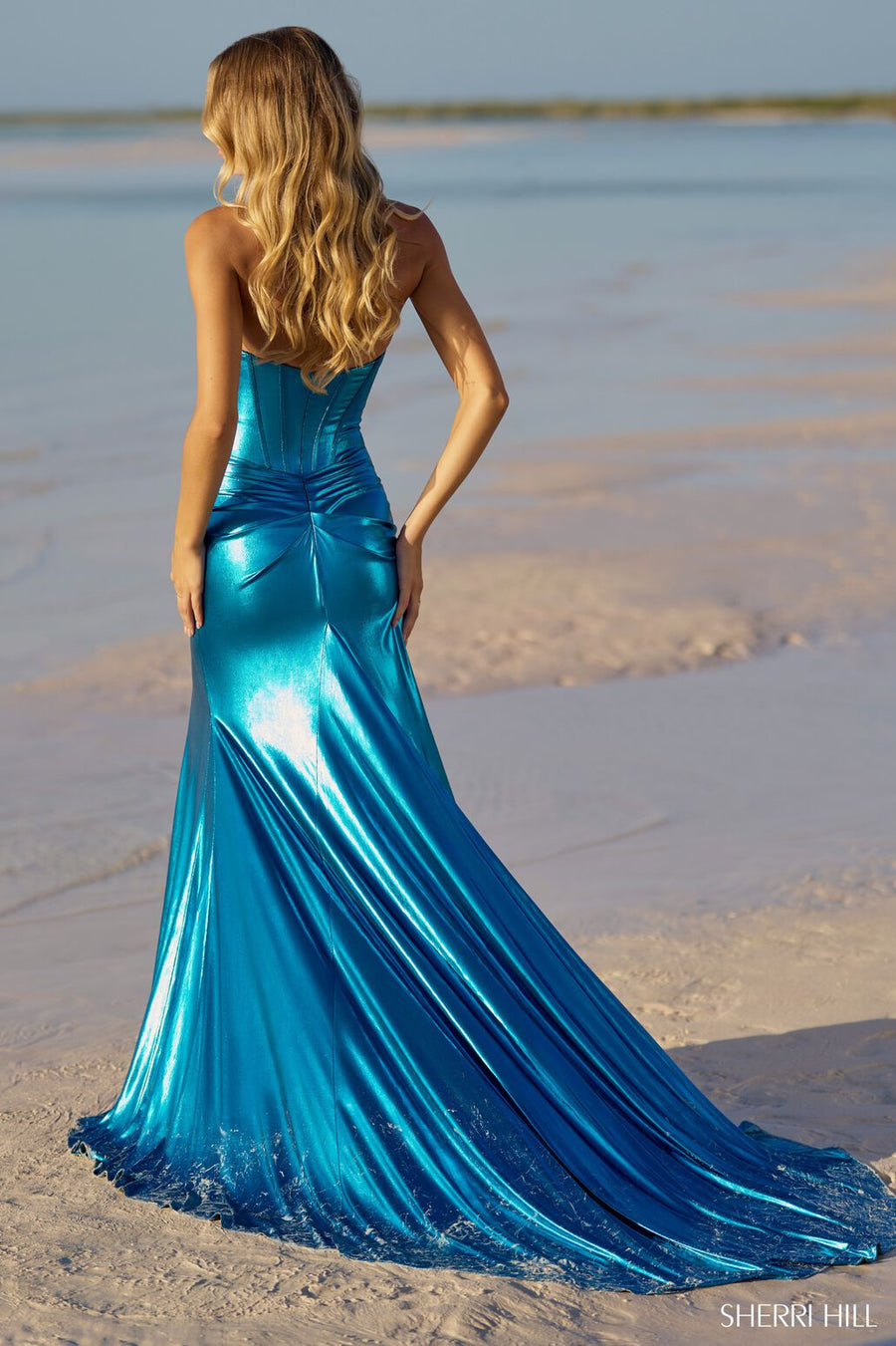 Sherri Hill 56085 prom dress images.  Sherri Hill 56085 is available in these colors: Royal, Black, Magenta, Gold, Ocean Blue.