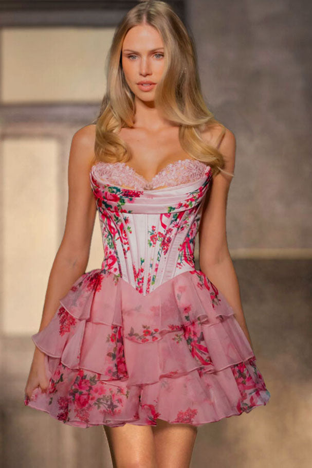 Model wearing Sherri Hill 57296 formal dress in Pink Print floral corset bodice, lace sweetheart neckline, and tiered chiffon ruffle skirt.