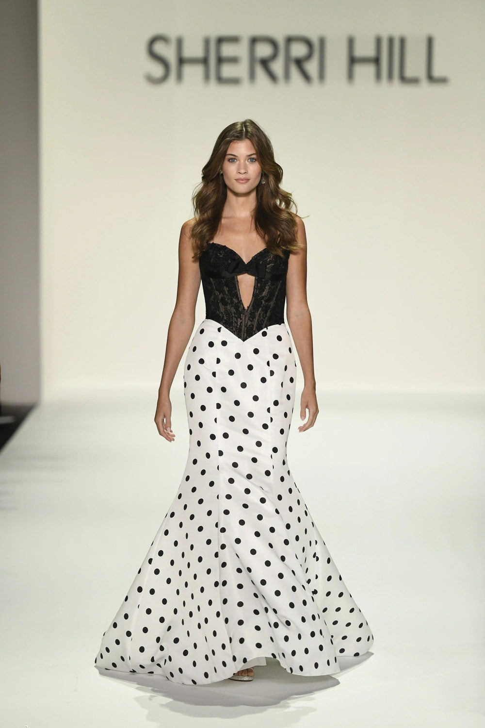 Sherri Hill 57932 prom dress images.  Sherri Hill 57932 is available in these colors: Black Ivory.