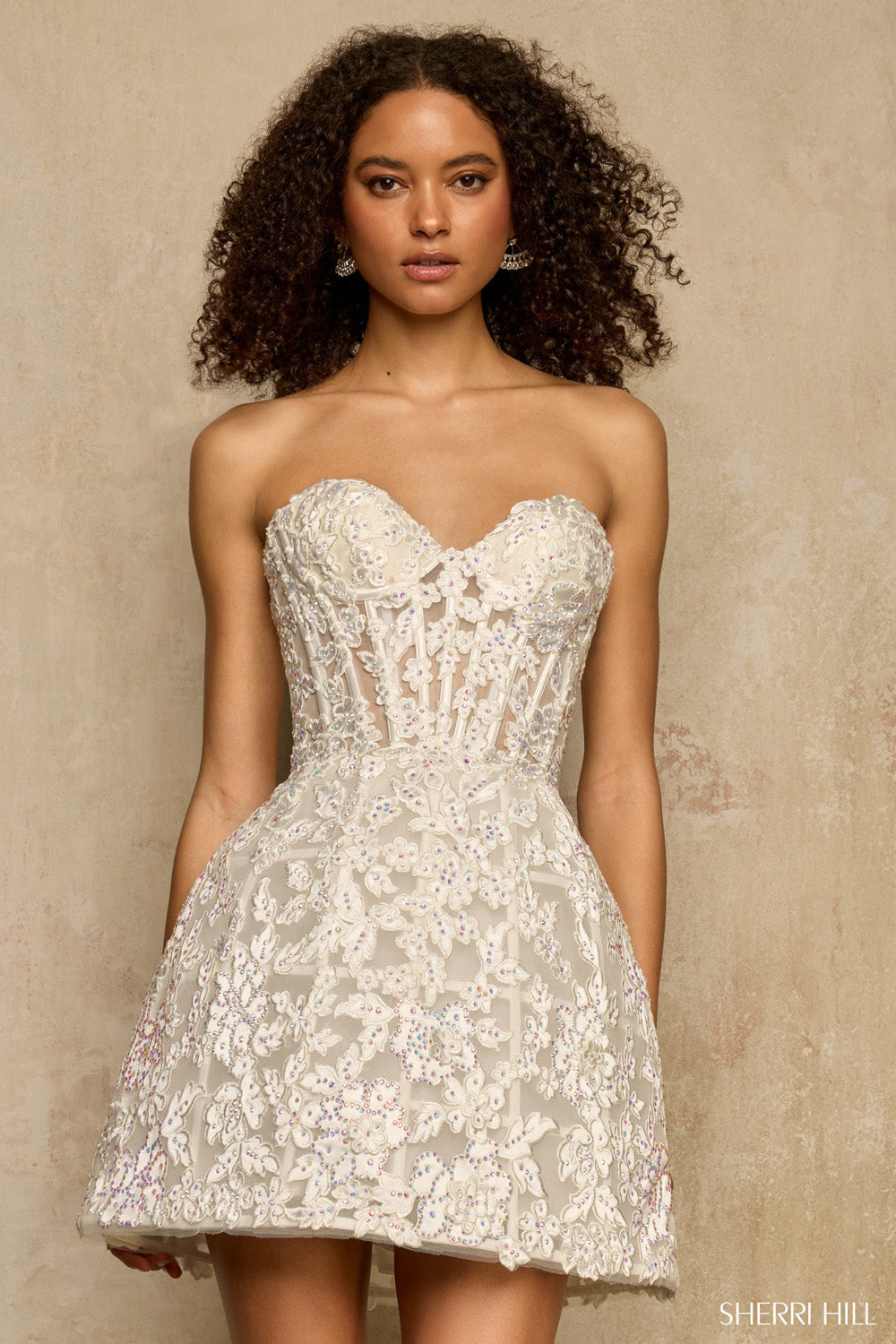 Front view of Sherri Hill 58206 ivory corset mini dress with sweetheart neckline and rhinestone floral appliqués.