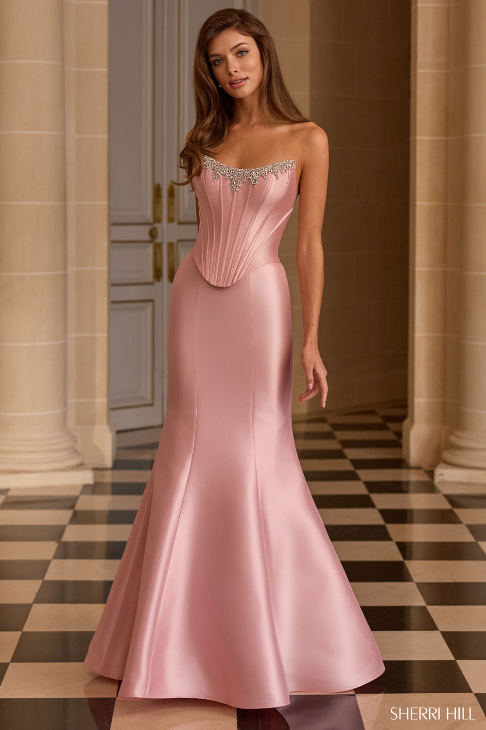Sherri Hill 58226 in blush pink mermaid silhouette with rhinestone-trimmed sweetheart corset bodice, full-length front view