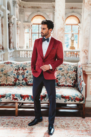 Ruby Red Venice Velvet Tuxedo is a single button shawl lapel jacket with double vents and a Ultra Slim tailored fit