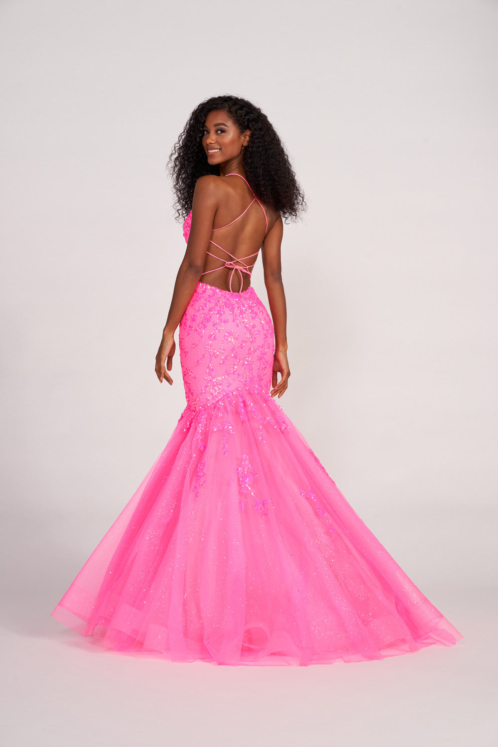 Ellie Wilde EW34011 prom dress images.  Ellie Wilde EW34011 is available in these colors: Hot Pink, Emerald, Orange, Periwinkle.