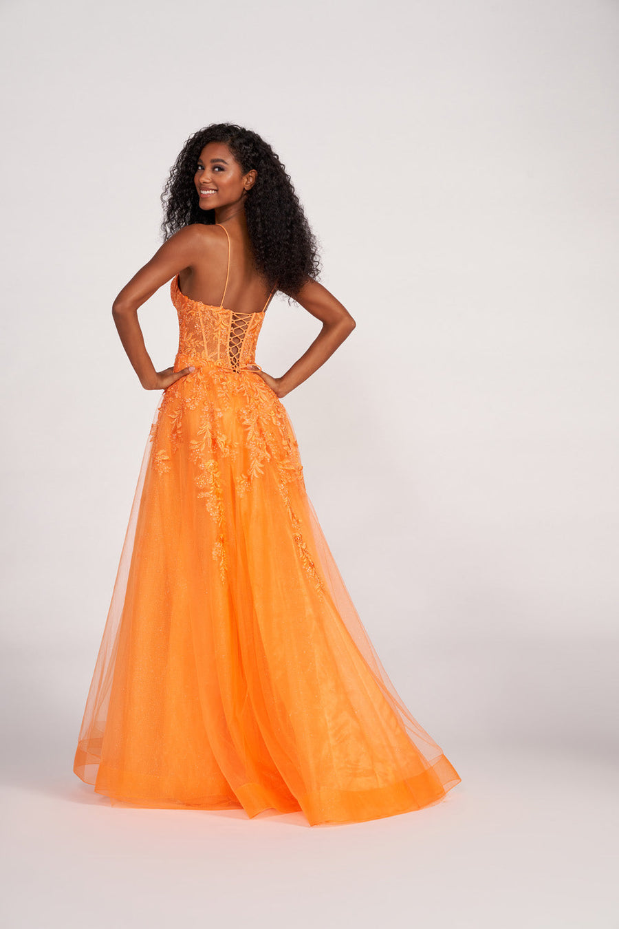 Ellie Wilde EW34036 prom dress images.  Ellie Wilde EW34036 is available in these colors: Orange, Yellow, Royal Blue, Magenta, Emerald.