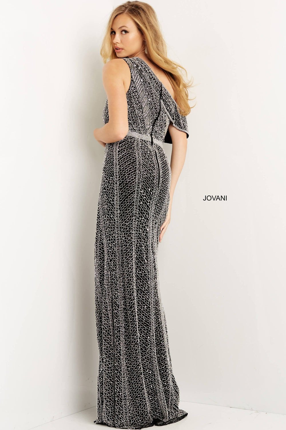 Jovani 08454 prom dress images.  Jovani style 08454 is available in these colors: Black Silver, Fuchsia Silver, White Silver.