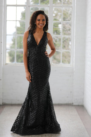 Miah Vega 15999 geometric sequins prom dresses comes in the following colors: Black, Hot Pink, Royal, Red and White.