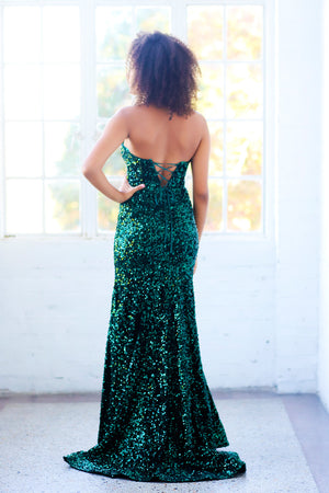 Miah Vega 23293 emerald prom dress image comes in the following colors: Black Pink, Emerald and Royal Blue. $418 is the Formal Approach best price guarantee