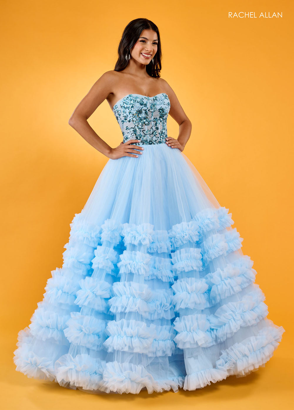 Rachel Allan 70621 prom dress images.  Rachel Allan 70621 is available in these colors: Light Blue, Pink, Red.