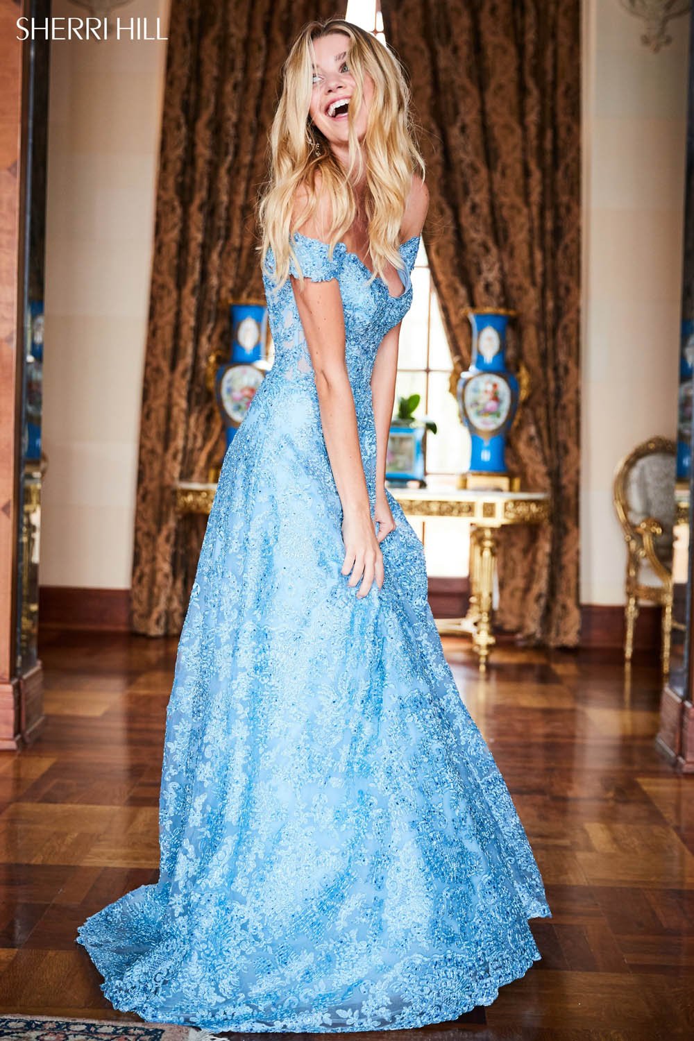 Sherri Hill 51573 prom dress images.  Sherri Hill 51573 is available in these colors: Gold, Light Blue, Silver, Black, Ivory.
